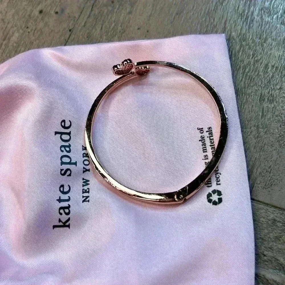 Kate Spade hinged bracelet, rose gold with rhinestones